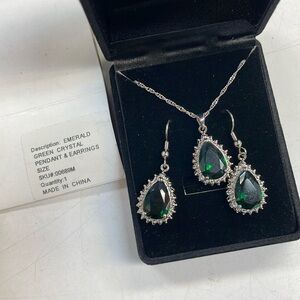Emerald green crystal pendant and earrings